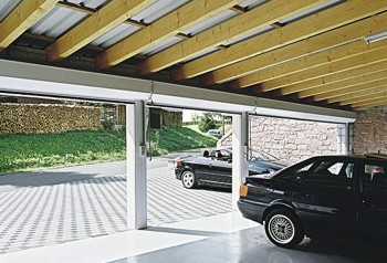 triple garage with roller shutters